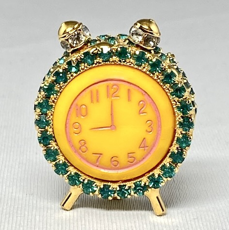 SJ63 Dorothy Bauer alarm clock pin